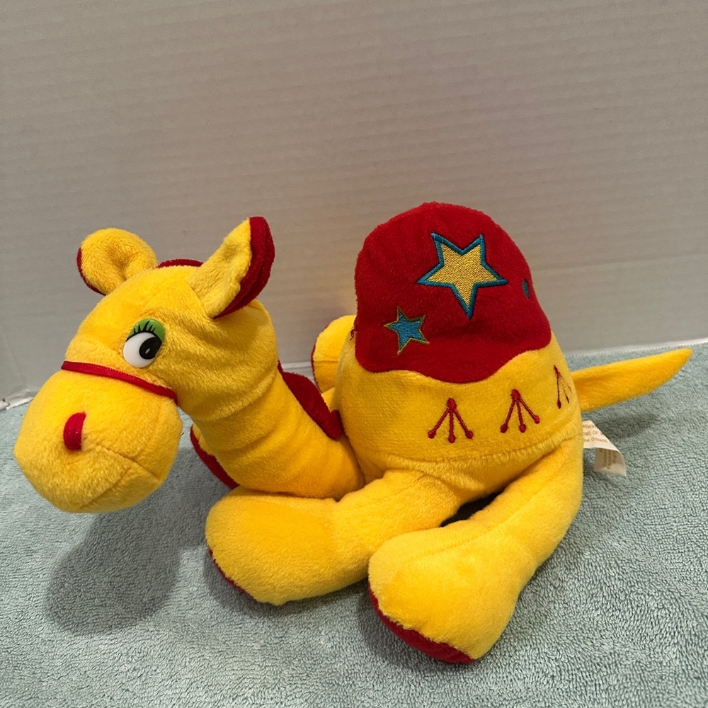 Plush Appeal Home of the Mardi Gras Vintage Camel Red Yellow Laying Down 12”